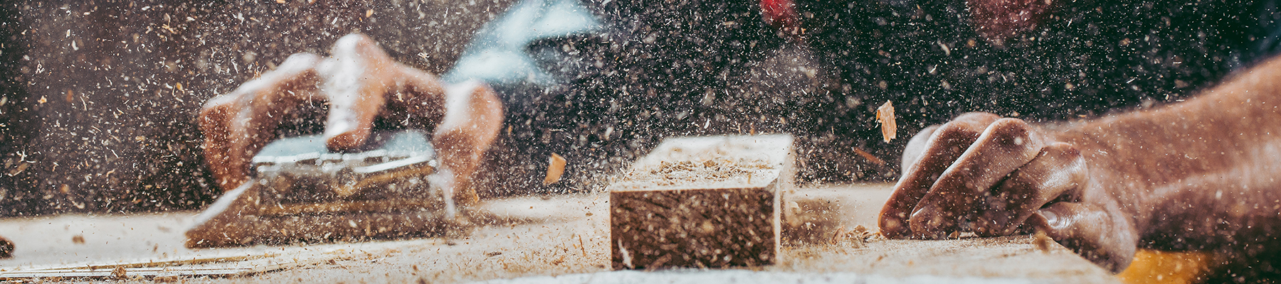 Young handosme carpenter. Shallow DOF. Developed from RAW; retouched with special care and attention; Small amount of grain added for best final impression.