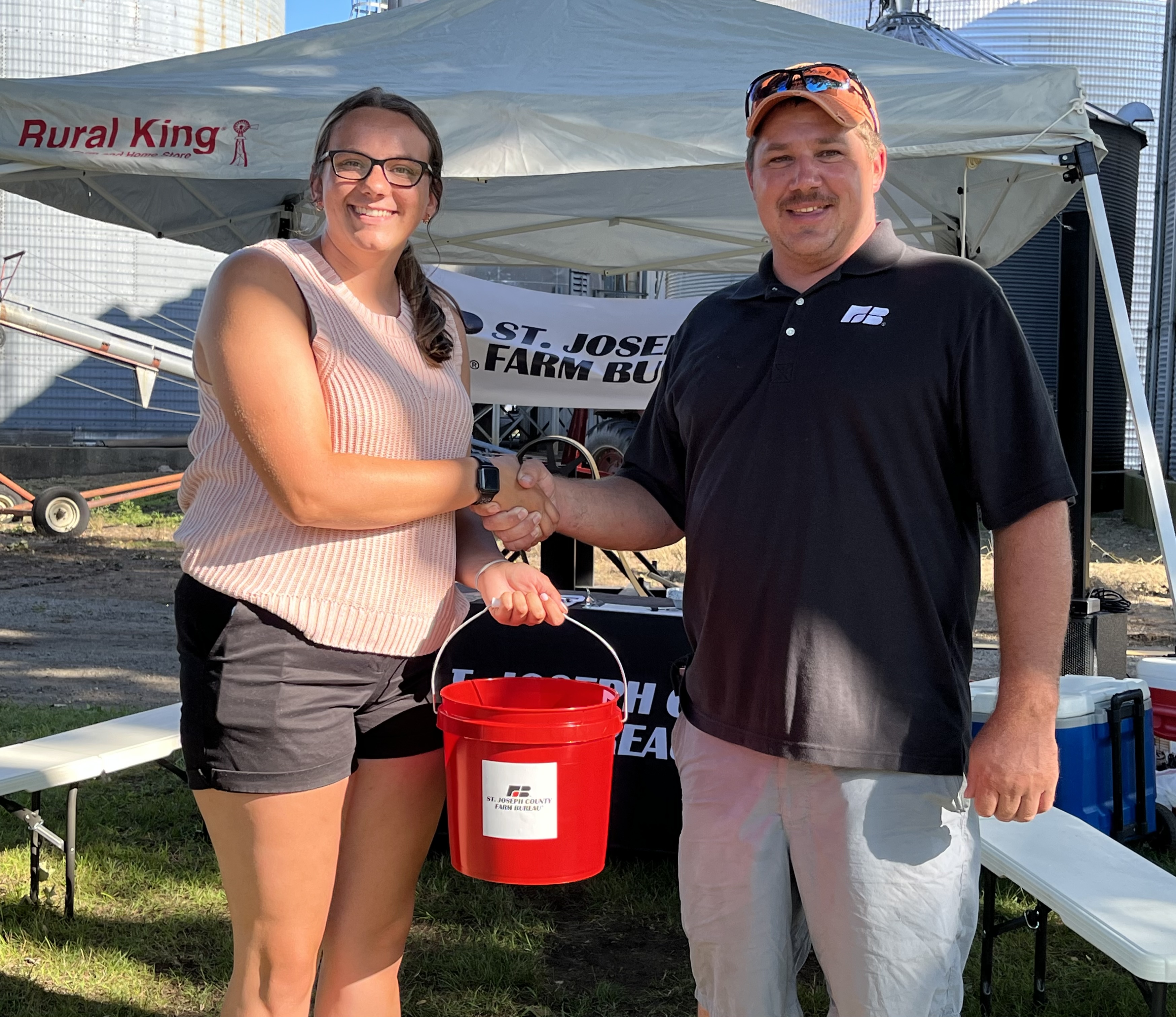 President Rich Baker presenting Emily Mead with her Scholarship.
