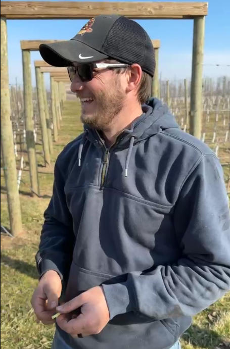 Noah Roth of Red Barn Market in Lowell, Michigan, at the u-pick orchard.