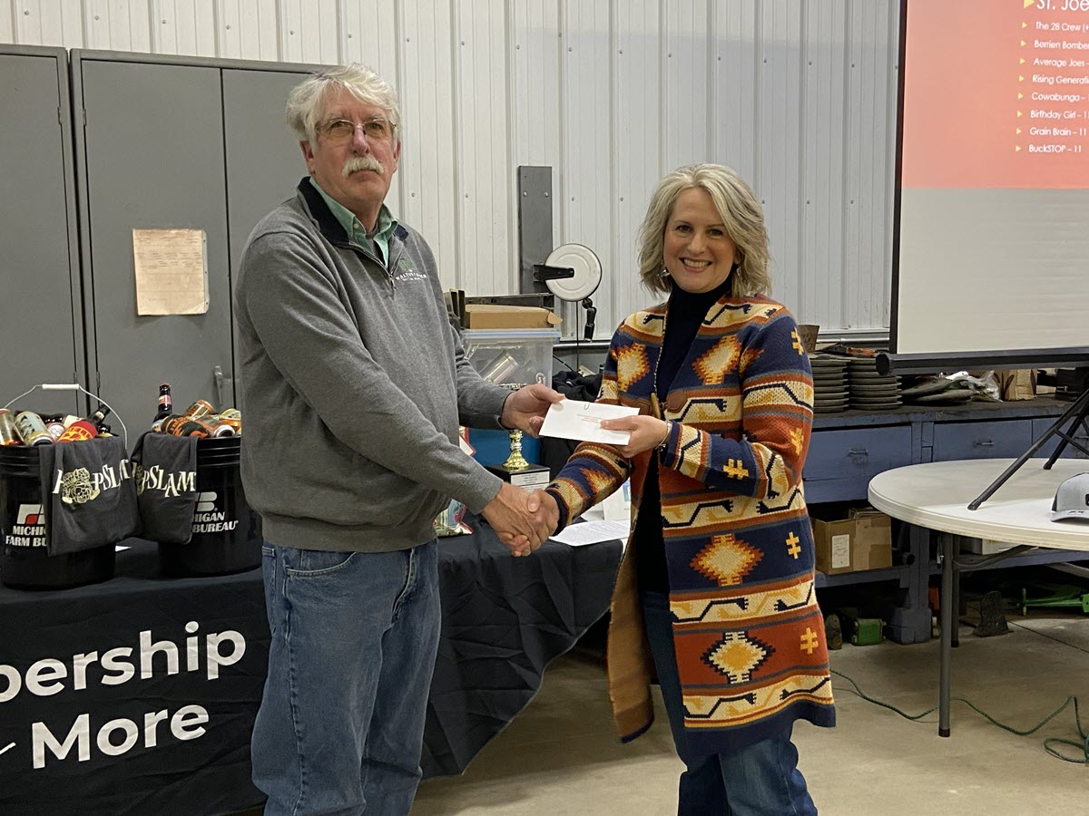 Larry Walton presenting Sponsor Chili Cook Off award
