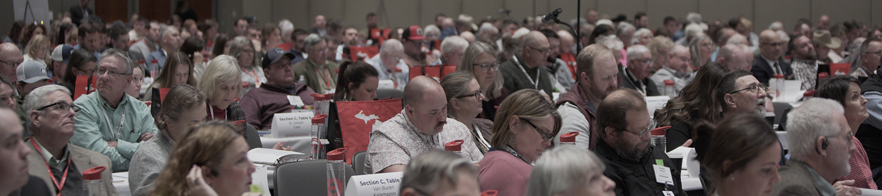 Wide shot of the bustling delegate floor of the 2026 MFB State Annual Meeting.