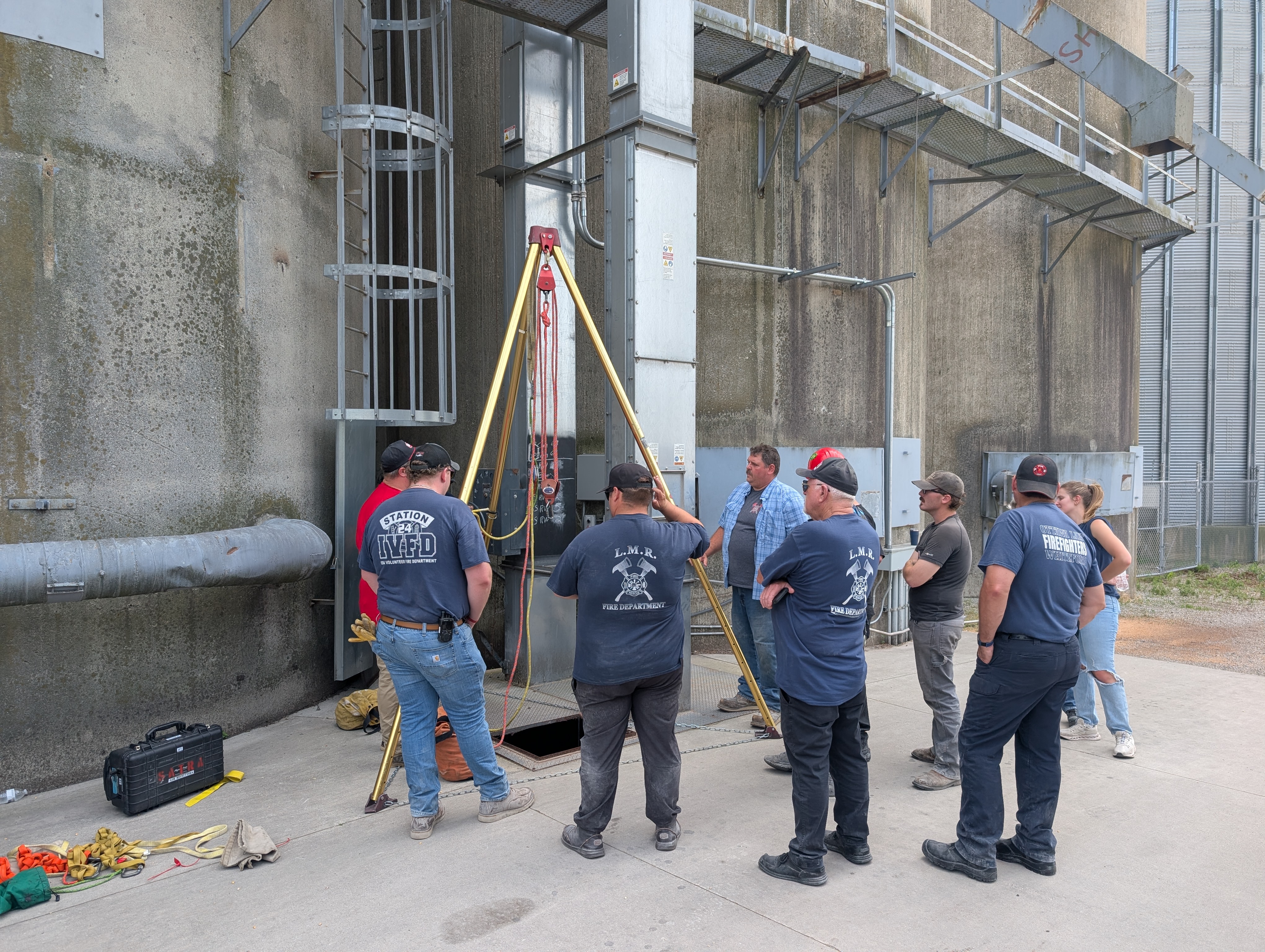 Firefighters training for a confined space scenario.