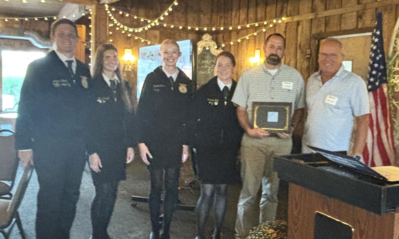 Lowell High School FFA receives their 2024 Kent County Farm Bureau Grant.