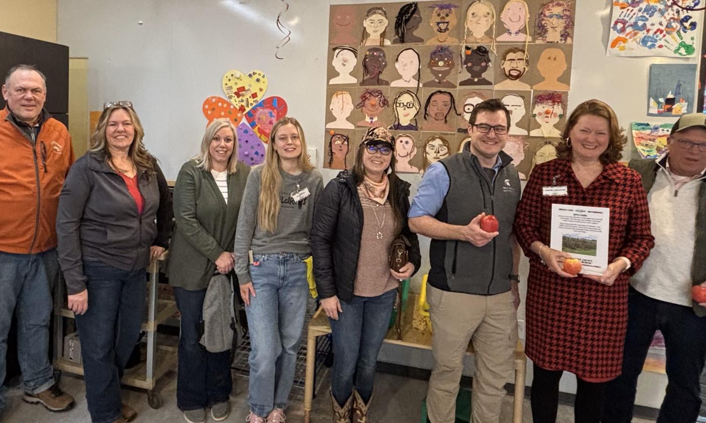 Kent County Farm Bureau Board of Directors and members with Grand Rapids Children's Museum staff in the Wonder Workshop.