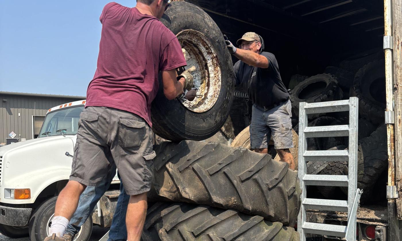 Farm Bureau members working the tire recycling event.