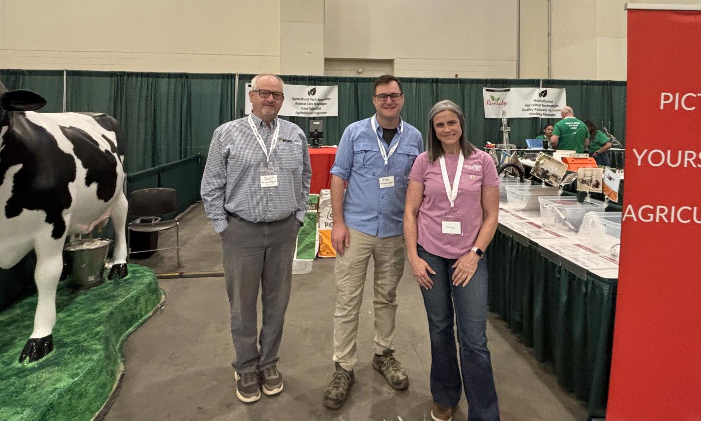 Kent County Farm Bureau Board of Directors members Scott Drown, Allan Robinette, and Annie Link at the 2026 MiCareerQuest booth Picture Yourself in Agriculture.