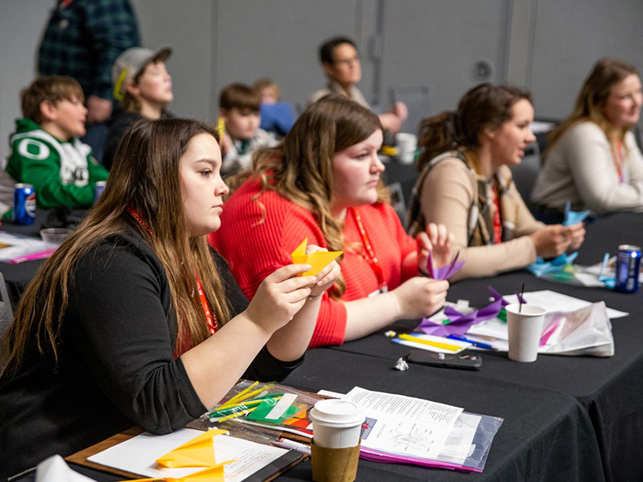 Growing Together Conference attendees participating in a breakfast Make-n-Take session.