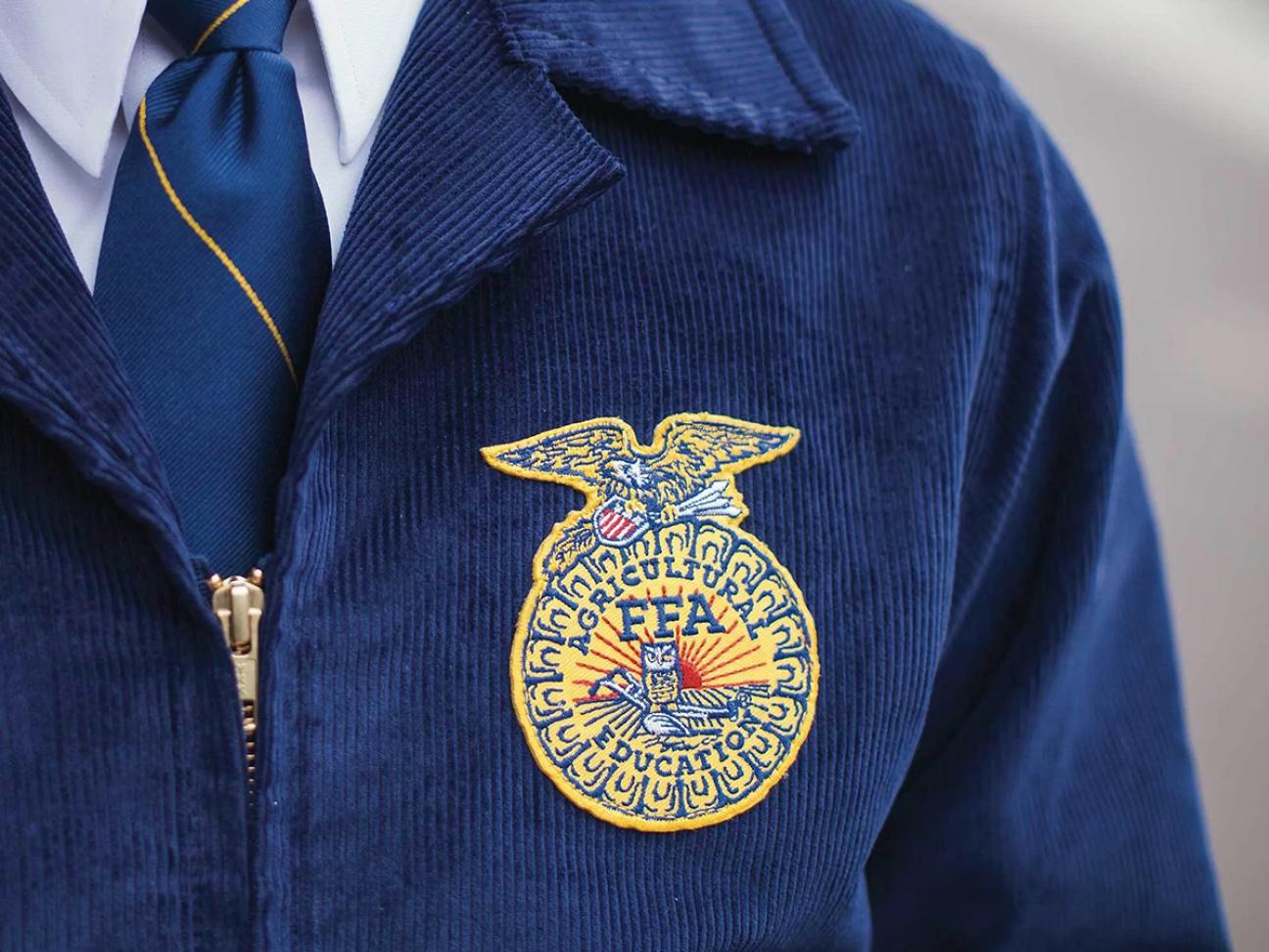 Close-up of the FFA patch on the front left breast of a student's FFA jacket.