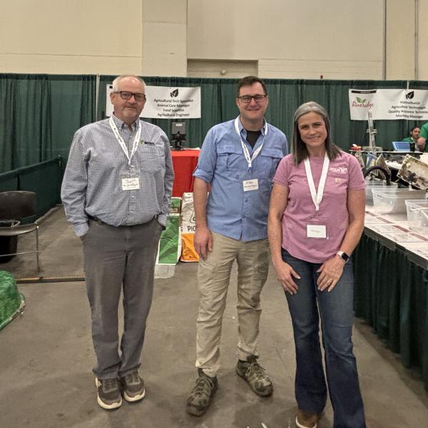 Kent County Farm Bureau Board of Directors members Scott Drown, Allan Robinette, and Annie Link at the 2026 MiCareerQuest booth Picture Yourself in Agriculture.