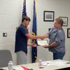 2023 Scholarship winner Jordan Socolovitch receiving his certificate from President Whittaker.