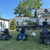 Three wheelchairs for outdoor sporting activities.